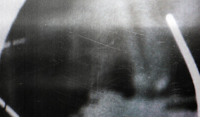 vintage film overlay with scratches, dust, and light leak on dark background retro cinematic texture