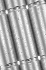 Aluminum beverage sleek can 330ml with water droplets stacked in multiple rows. 3D rendering.
