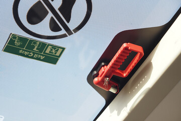 Safety handle attached to vehicle window for security