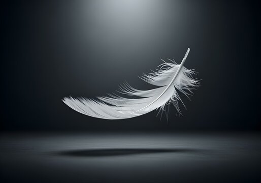 A single white feather falling gracefully against a dark background