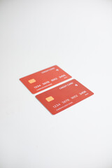 credit card, modern payment tool, transaction tool, two red credit cards isolated on a white background.