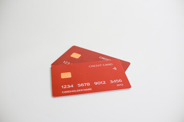 credit card, modern payment tool, transaction tool, two red credit cards isolated on a white background.