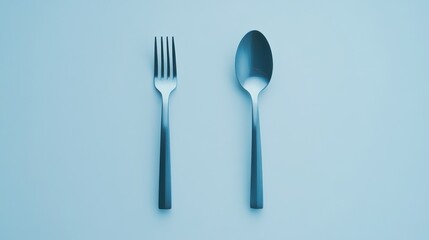 A studio shot of a fork and spoon