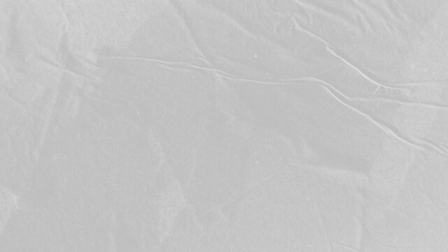 Distressed Paper Animation. A grunge, stop-motion texture of folded and creased white paper.