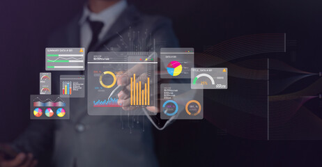 Analysts using big data dashboards to assess performance, KPIs, strategic decisions with AI and...