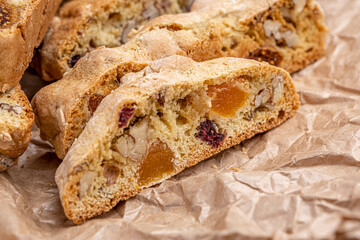 Italian Almond Biscotti biscuits in a rustic home made pottery bowl. Studded with almonds and...
