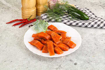 Red pickled herring fish fillet