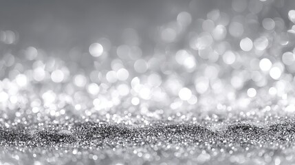 Abstract silver and white glitter background with vintage bokeh lights and soft defocused glow for elegant holiday, wedding, or celebration banner design