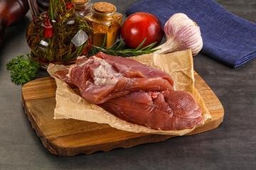 Raw uncooked turkey thigh fillet
