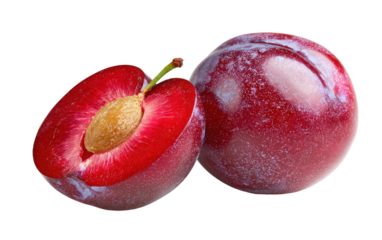 Fresh ripe plums one cut in half on transparent background