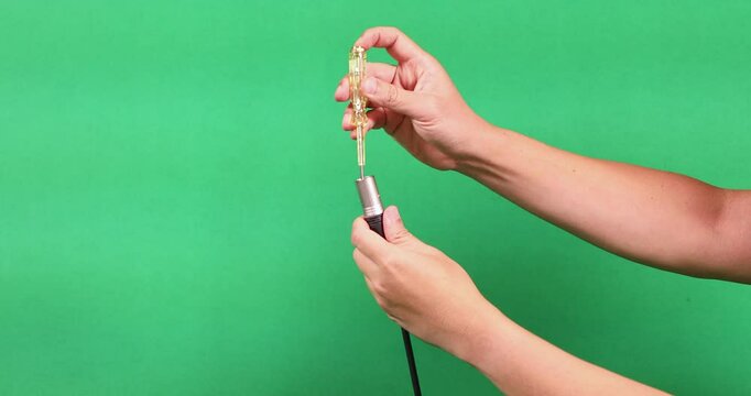 The technician used a screwdriver to check the electricity and poke it into the electronic panel.