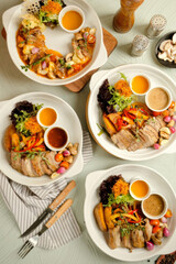 Delicious Grilled Beef Medallions Served with Fresh Vegetables and Dipping Sauces