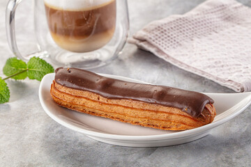 Gourmet chocolate eclair with icing