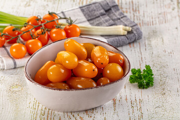 Marinated yellow cherry tomatoes heap