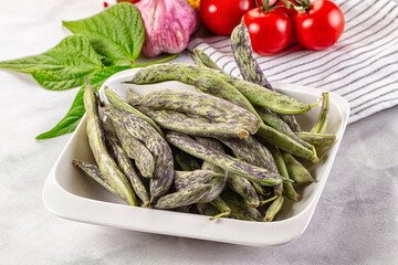Raw green bean strips heap
