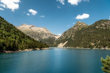 Lac d'Oredon in the French Pyrenees with the dam wall of Lac-de-Cap-Long in the distance
