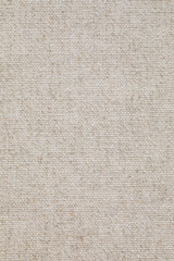 Close-up of natural beige linen fabric with visible weave, offering a neutral and organic textile background ideal for design, packaging, or product mockups.