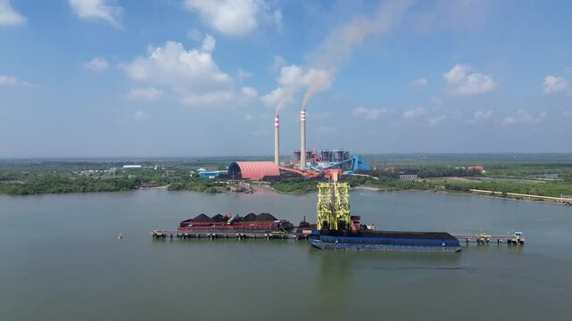 Coal Power Plant and Port Terminal in Langkat, North Sumatra, Indonesia - Drone Aerial Footage