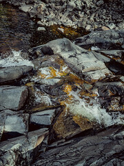 Small rocky waterfall flowing. photo