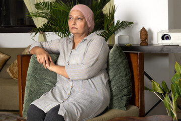 Last stage cancer woman feel bad at home. 
Indian Sad woman worrying about her health condition