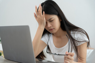 Eye problems, Asian women with tired and irritated eyes, eye rubbing, dry, eye pain after work,...