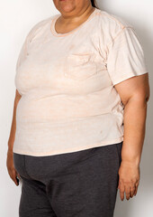 Close shot of plus size fat woman on gray background