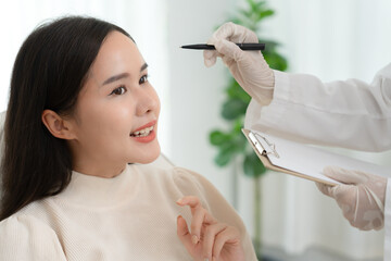 Cosmetic surgery advice about surgery face. beauty asian smile and happy after surgery, skin...