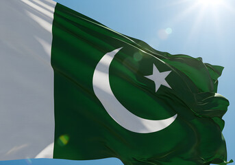 Pakistani Flag Waving Against Blue Sky | National Symbol of Pakistan for Independence Day, Patriotic Events, and Cultural Celebrations