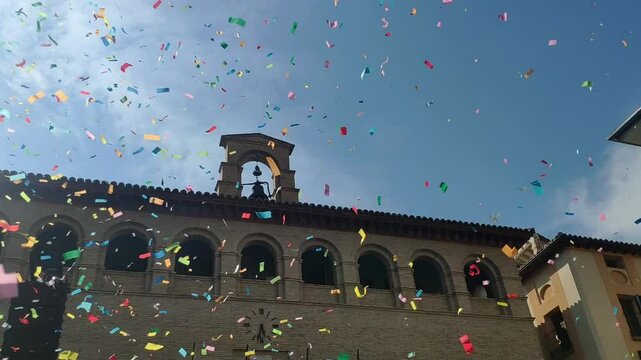 Celebratory confetti falls outside Borja Town Hall during the Amante Festival in Aragon