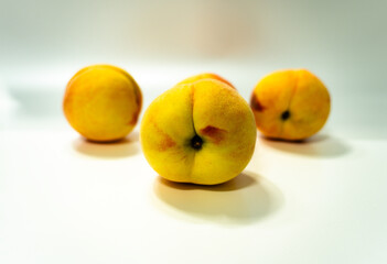 Fresh peaches, isolated on white background
