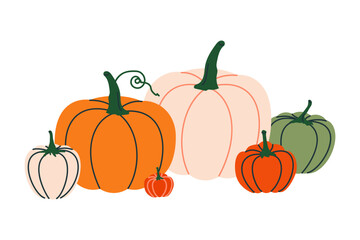 Pumpkins of various sizes and colors create a festive autumn scene, perfect for harvest celebrations