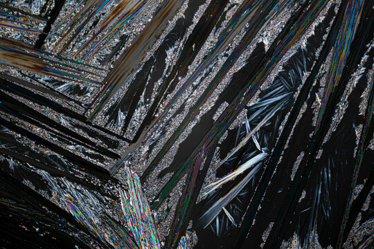 Colorful microcrystals of urea examined under a microscope