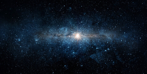 Big star in the starry night sky. Wide space background. Elements of this image furnished by NASA.
