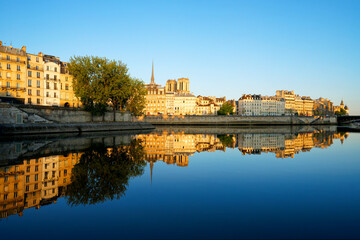 Notre-Dame water reflection in the Seine river. 4th arrondissemnt of Paris city