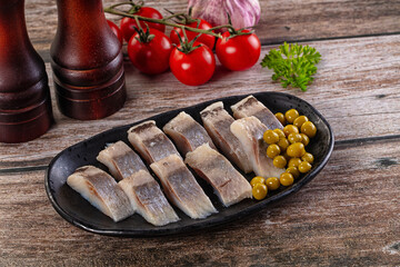 Slided marinated salted herring fillet