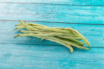 Raw green string beans heap
