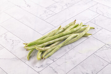 Raw green string beans heap