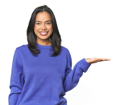 Simple portrait of a young Latina showing a copy space on a palm and holding another hand on waist.