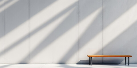Minimalist home interior with an empty white chair against a bright wall, showcasing modern furniture design and natural light from the window