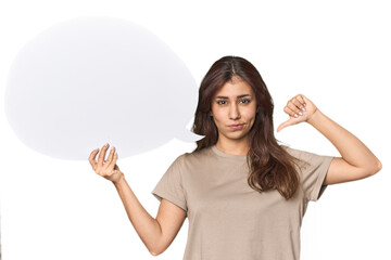 Middle Eastern woman holding comic bubble feels proud and self confident, example to follow.
