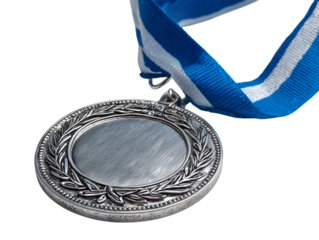 A close-up captures the gleam of a silver medal, suspended by a blue and white ribbon, evoking a sense of honor and victory. 