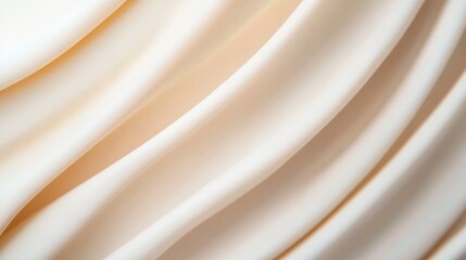 Elegant draped fabric showcasing smooth curves and soft textures in neutral hue