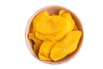 Dried Mango in ceramic bowl isolated on white. Top view, close up