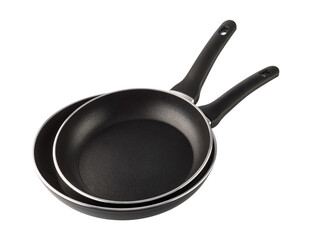 Two black frying pans with non-stick coating on transparent background