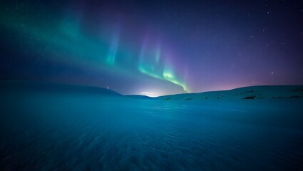 Naklejka premium Majestic Aurora Borealis Dances Above Snowy Mountain Landscape
