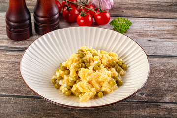 Scrambled egg omelet with green peas