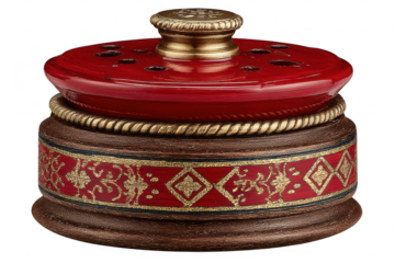 Red ceramic pen holder with brass accents and decorative base