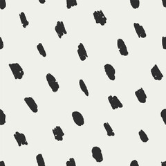 Seamless abstract pattern with paint stains, paintbrush spots, smears. Endless texture, print design with drawn brushstrokes, ink blots, smudges, irregular black and white shapes. Vector illustration