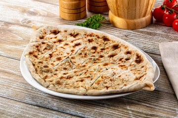 Turkish Kutab staffed green herbs