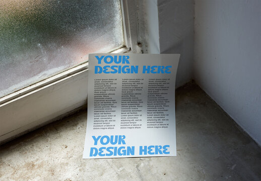 mockup showcasing an A3 poster placed beside a window on a concrete floor.
